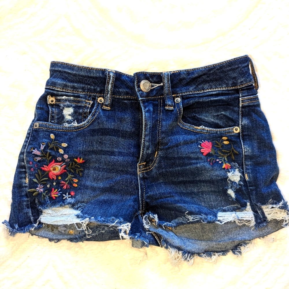Floral destructed denim